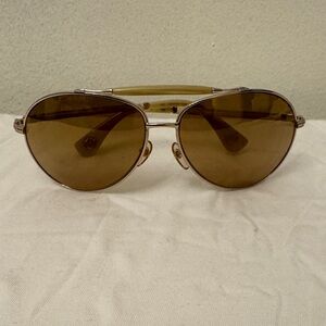 Michael Kors aviator sunglasses.